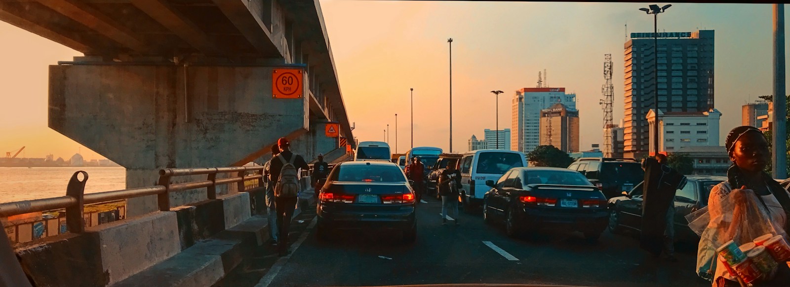 Cars on a Lagos bridge at sunset