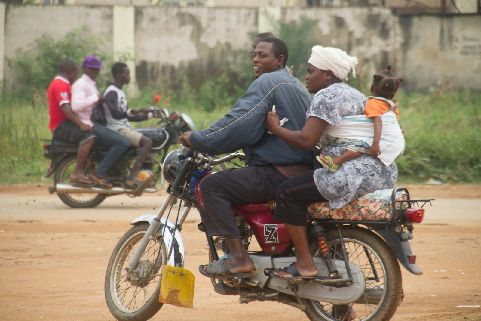 Family on a motorbike on an Abuja road
